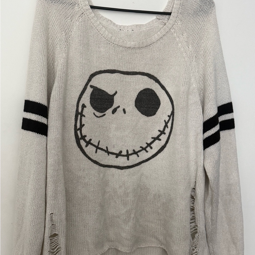 Disney Cream Knit Crewneck Sweater with Black Skull Graphic